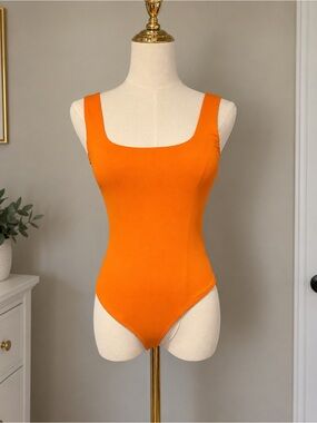 Francesca’s Ayla Orange Bodysuit